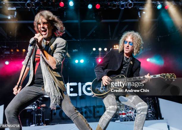 Kelly Hansen and Bruce Watson of Foreigner perform on stage at Abbotsford Centre on October 22, 2017 in Abbotsford, Canada.