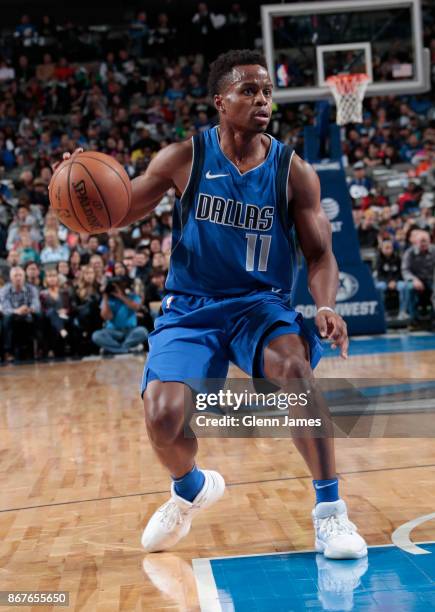 Yogi Ferrell of the Dallas Mavericks handles the ball against the Philadelphia 76ers on October 28, 2017 at the American Airlines Center in Dallas,...