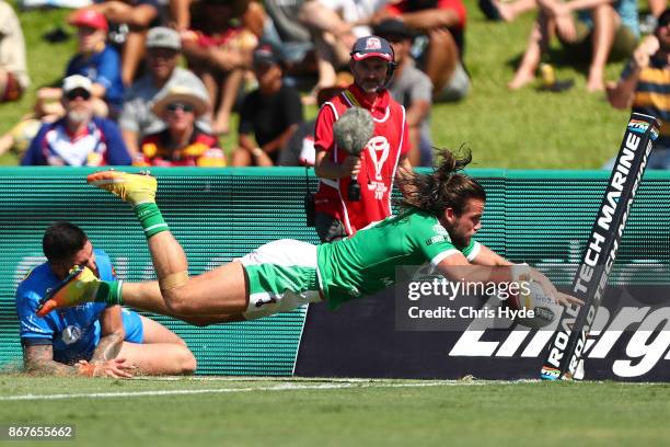 Liam Kay of Ireland scores a try during the 2017 Rugby League World Cup match between Ireland and Italy at Barlow Park on October 29, 2017 in Cairns,...