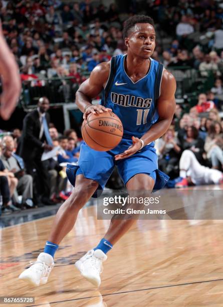 Yogi Ferrell of the Dallas Mavericks handles the ball against the Philadelphia 76ers on October 28, 2017 at the American Airlines Center in Dallas,...