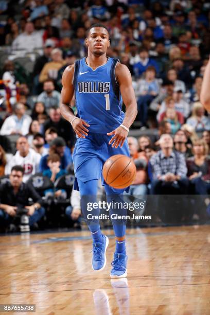 Dennis Smith Jr. #1 of the Dallas Mavericks handles the ball against the Philadelphia 76ers on October 28, 2017 at the American Airlines Center in...