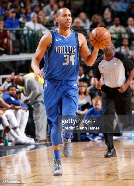 Devin Harris of the Dallas Mavericks handles the ball against the Philadelphia 76ers on October 28, 2017 at the American Airlines Center in Dallas,...