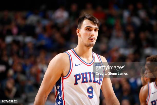 Dario Saric of the Philadelphia 76ers looks on during the game against the Dallas Mavericks on October 28, 2017 at the American Airlines Center in...