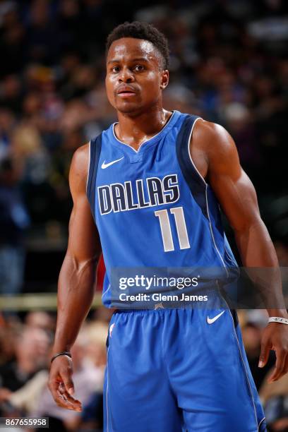 Yogi Ferrell of the Dallas Mavericks looks on during the game against the Philadelphia 76ers on October 28, 2017 at the American Airlines Center in...