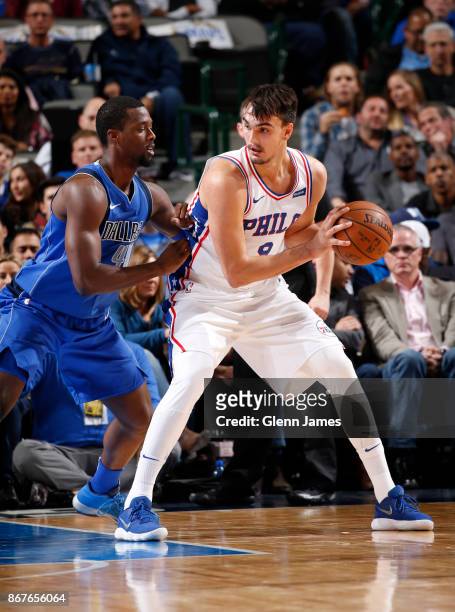 Dario Saric of the Philadelphia 76ers handles the ball against the Dallas Mavericks on October 28, 2017 at the American Airlines Center in Dallas,...