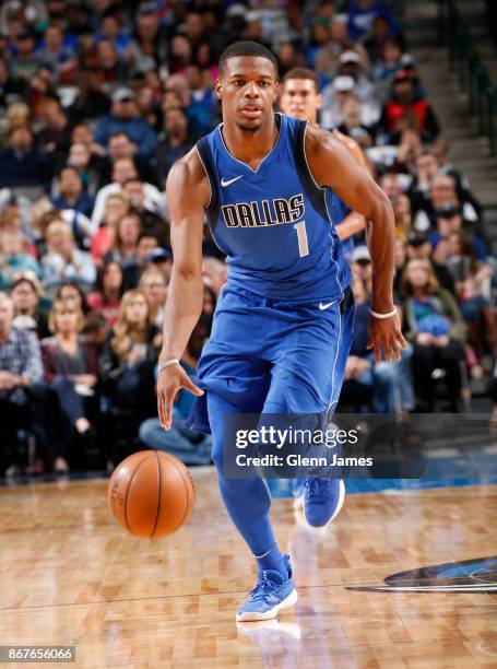 Dennis Smith Jr. #1 of the Dallas Mavericks handles the ball against the Philadelphia 76ers on October 28, 2017 at the American Airlines Center in...