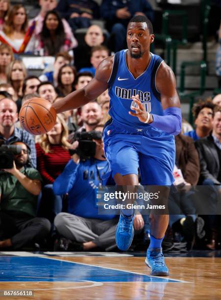 Harrison Barnes of the Dallas Mavericks handles the ball against the Philadelphia 76ers on October 28, 2017 at the American Airlines Center in...