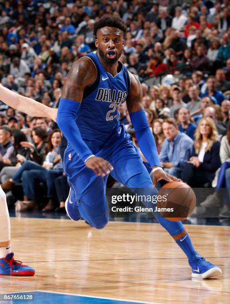 Wesley Matthews of the Dallas Mavericks handles the ball against the Philadelphia 76ers on October 28, 2017 at the American Airlines Center in...