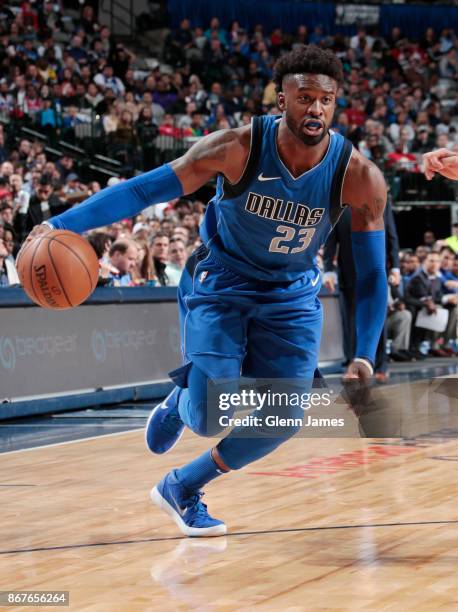 Wesley Matthews of the Dallas Mavericks handles the ball against the Philadelphia 76ers on October 28, 2017 at the American Airlines Center in...