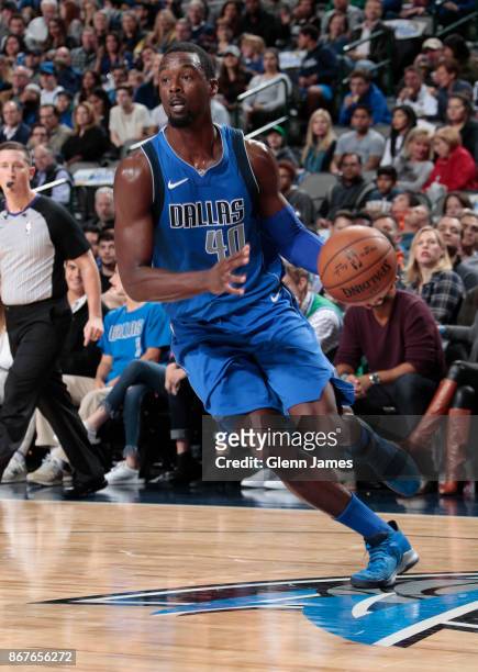 Harrison Barnes of the Dallas Mavericks handles the ball against the Philadelphia 76ers on October 28, 2017 at the American Airlines Center in...