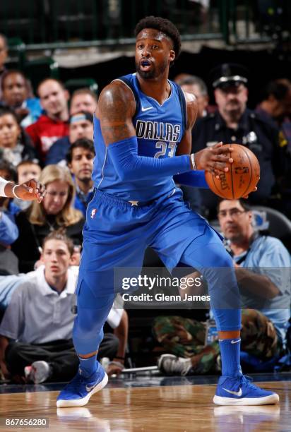 Wesley Matthews of the Dallas Mavericks handles the ball against the Philadelphia 76ers on October 28, 2017 at the American Airlines Center in...