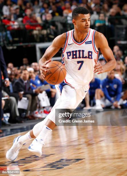 Timothe Luwawu-Cabarrot of the Philadelphia 76ers handles the ball against the Dallas Mavericks on October 28, 2017 at the American Airlines Center...