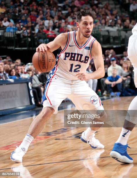 McConnell of the Philadelphia 76ers handles the ball against the Dallas Mavericks on October 28, 2017 at the American Airlines Center in Dallas,...