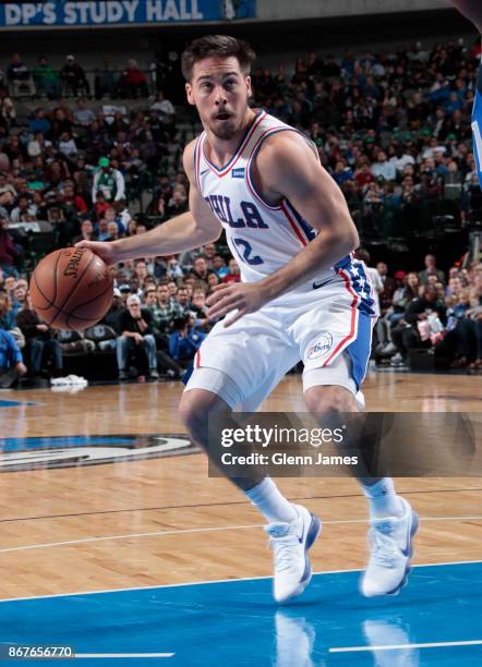 McConnell of the Philadelphia 76ers handles the ball against the Dallas Mavericks on October 28, 2017 at the American Airlines Center in Dallas,...