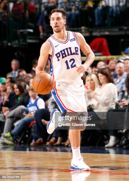 McConnell of the Philadelphia 76ers handles the ball against the Dallas Mavericks on October 28, 2017 at the American Airlines Center in Dallas,...
