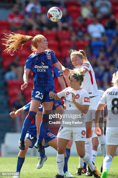 Tori Huster of the Jets contests the ball during the round one W-League match between the Newcastle Jets and the Western Sydney Wanderers at McDonald...