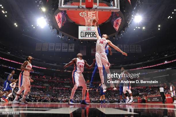 Jon Leuer of the Detroit Pistons goes up for a rebound against the LA Clippers on October 28, 2017 at STAPLES Center in Los Angeles, California. NOTE...