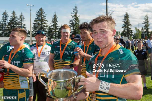 Jared Percival of Mid Canterbury poses with the Lochore Cup after the win in the Mitre 10 Heartland Championship Lochore Cup Final match between Mid...