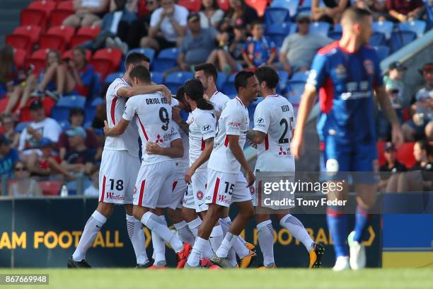 Wanderers players celebrate a goal during the round four A-League match between the Newcastle Jets and the Western Sydney Wanderers at McDonald Jones...