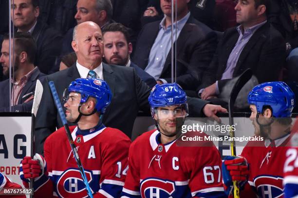 Head coach of the Montreal Canadiens Claude Julien looks on from the bench against the Los Angeles Kings during the NHL game at the Bell Centre on...