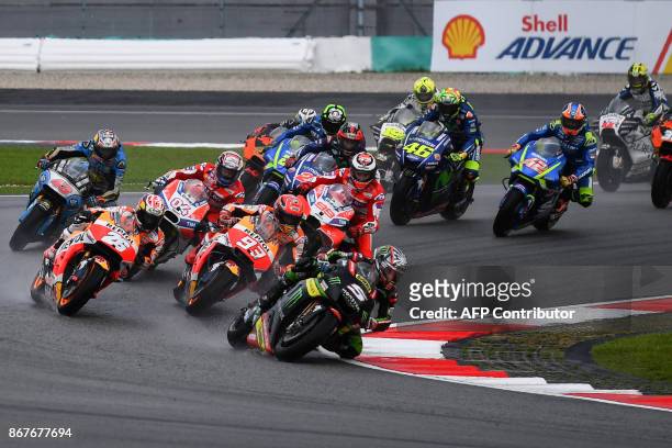 Monster Yamaha Tech 3 French rider Johann Zarco leads the pack during the start of the Malaysia MotoGP at the Sepang International circuit on October...