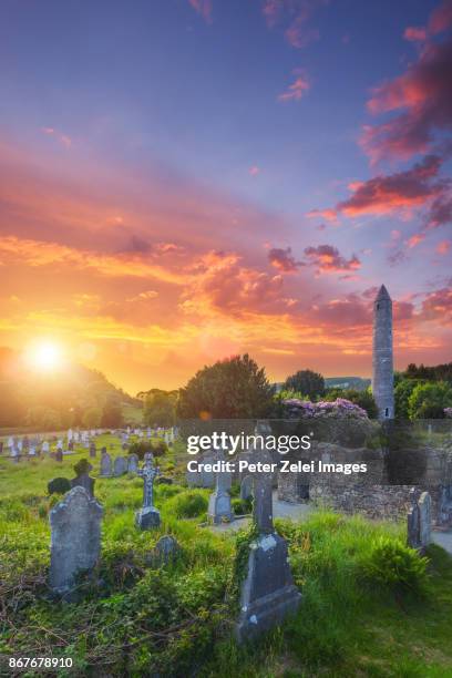 glendalough monastic site with the round tower and cemetery in county wicklow, ireland - irish round tower 個照片及圖片檔