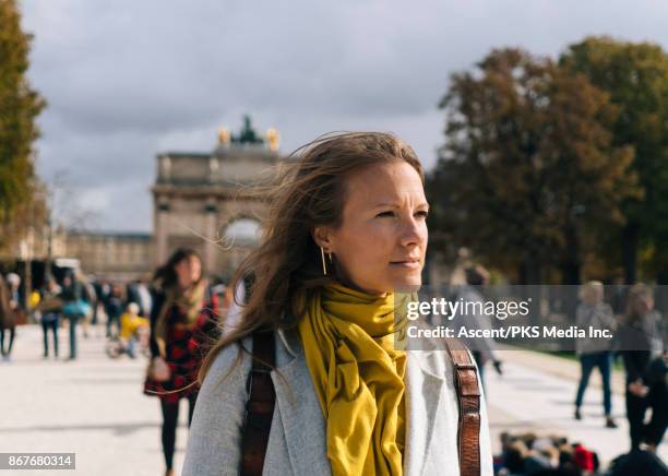 woman walking the streets of paris - paris street woman stock pictures, royalty-free photos & images