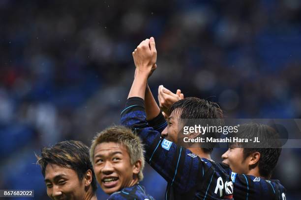 Shun Nagasawa of Gamba Osaka celebrates scoring the opening goal with his team mates during the J.League J1 match between Gamba Osaka and Vegalta...