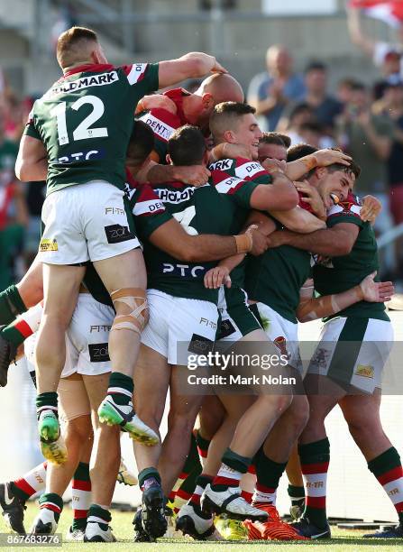 Lebanon players celebrate a try by Mitchell Moses during the 2017 Rugby League World Cup match between France and Lebanon at Canberra Stadium on...