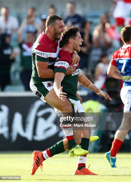 Robbie Farah and Mitchell Moses of Lebanon celebrate a try by Mitchell Moses during the 2017 Rugby League World Cup match between France and Lebanon...