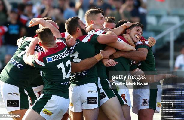 Lebanon players celebrate a try by Mitchell Moses during the 2017 Rugby League World Cup match between France and Lebanon at Canberra Stadium on...