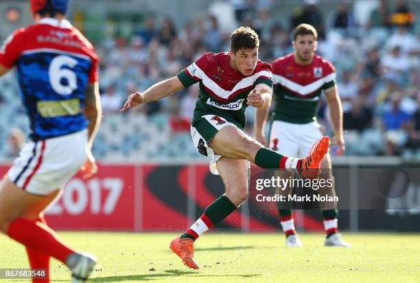 Mitchell Moses of Lebanon kicks a field goal during the 2017 Rugby League World Cup match between France and Lebanon at Canberra Stadium on October...