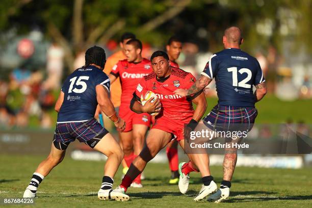 Jason Taumalolo of Tonga runs the ball during the 2017 Rugby League World Cup match between Scotland and Tonga at Barlow Park on October 29, 2017 in...
