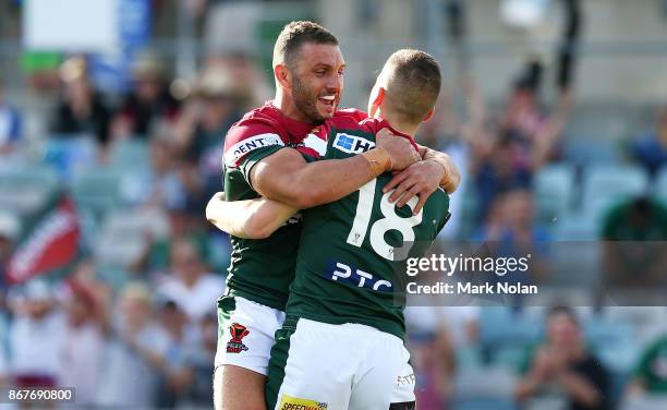 Robbie Farah and Adam Doueihi of Lebanon celebrate a try by Doueihi during the 2017 Rugby League World Cup match between France and Lebanon at...