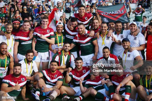 Lebanon celebrate after winning the 2017 Rugby League World Cup match between France and Lebanon at Canberra Stadium on October 29, 2017 in Canberra,...