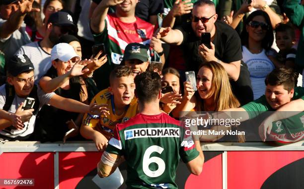 Mitchell Moses of Lebanon celebrates with fans after the 2017 Rugby League World Cup match between France and Lebanon at Canberra Stadium on October...