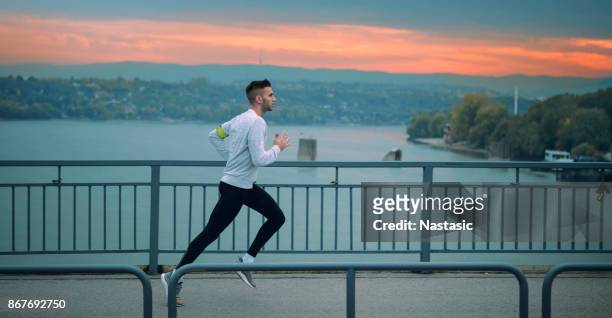 late run - dusk stock pictures, royalty-free photos & images
