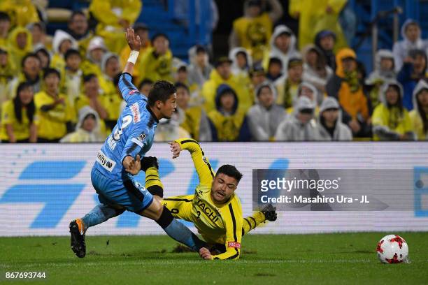 Cristiano of Kashiwa Reysol is tackled by Tatsuki Nara of Kawasaki Frontale during the J.League J1 match between Kashiwa Reysol and Kawasaki Frontale...