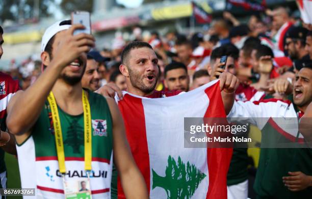 Robbie Farah of Lebanon celebrates after winning the 2017 Rugby League World Cup match between France and Lebanon at Canberra Stadium on October 29,...