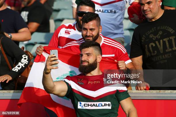 Abbas Miski of Lebanon celebrates after the 2017 Rugby League World Cup match between France and Lebanon at Canberra Stadium on October 29, 2017 in...