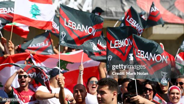 Lebanese fans celebrate during the 2017 Rugby League World Cup match between France and Lebanon at Canberra Stadium on October 29, 2017 in Canberra,...