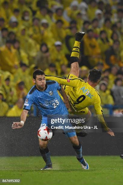 Cristiano of Kashiwa Reysol and Eduardo of Kawasaki Frontale compete for the ball during the J.League J1 match between Kashiwa Reysol and Kawasaki...