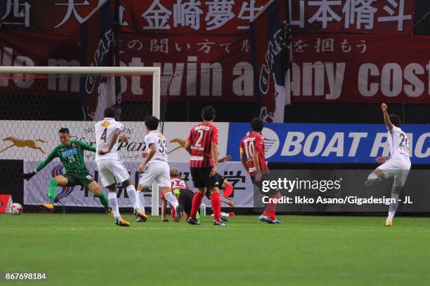 Kento Misao of Kashima Antlers scores the opening goal during the J.League J1 match between Consadole Sapporo and Kashima Antlers at Sapporo Dome on...