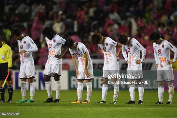 Omiya Ardija players show dejection after their 1-2 defeat in the J.League J1 match between Cerezo Osaka and Omiya Ardija at Kincho Stadium on...