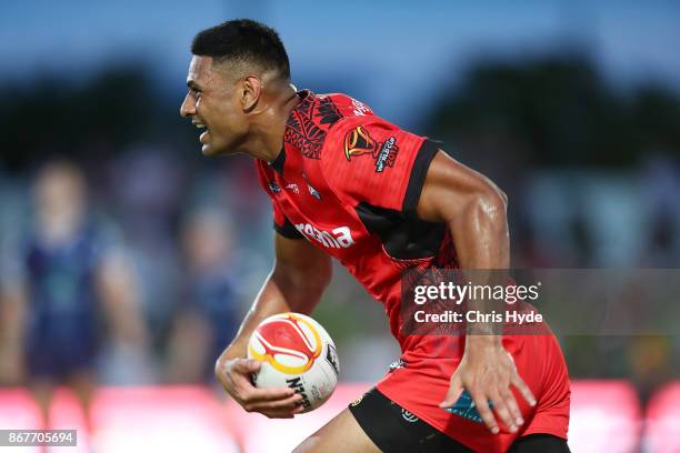 Daniel Tupou of Tonga runs the ball during the 2017 Rugby League World Cup match between Scotland and Tonga at Barlow Park on October 29, 2017 in...