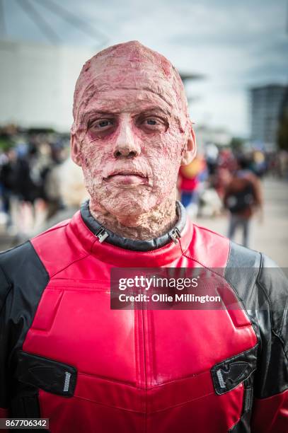 Cosplayer in character as Deadpool during MCM London Comic Con 2017 held at the ExCel on October 28, 2017 in London, England.