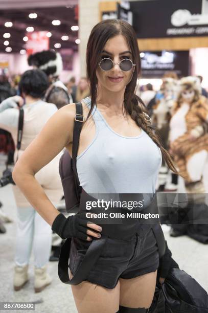 Cosplayer in charcter as Lara Croft The Tomb Raider during MCM London Comic Con 2017 held at the ExCel on October 28, 2017 in London, England.