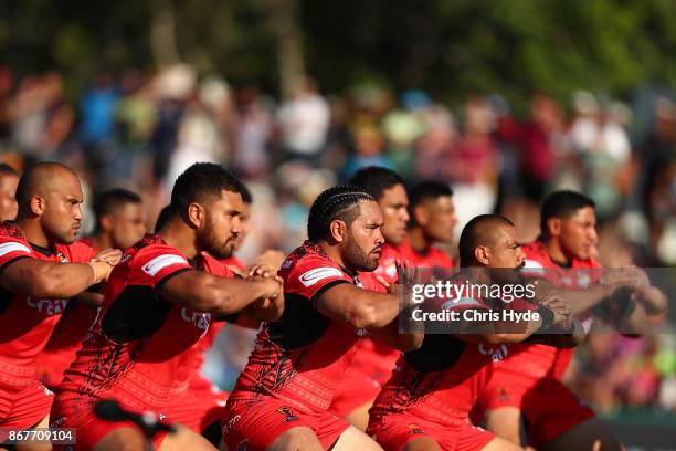 Tonga peform a traditional dance during the 2017 Rugby League World Cup match between Scotland and Tonga at Barlow Park on October 29, 2017 in...