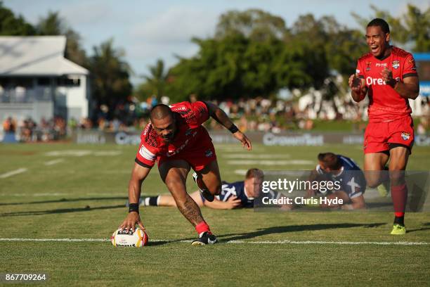 Sika Manu of Tonga makes a break to score a try during the 2017 Rugby League World Cup match between Scotland and Tonga at Barlow Park on October 29,...