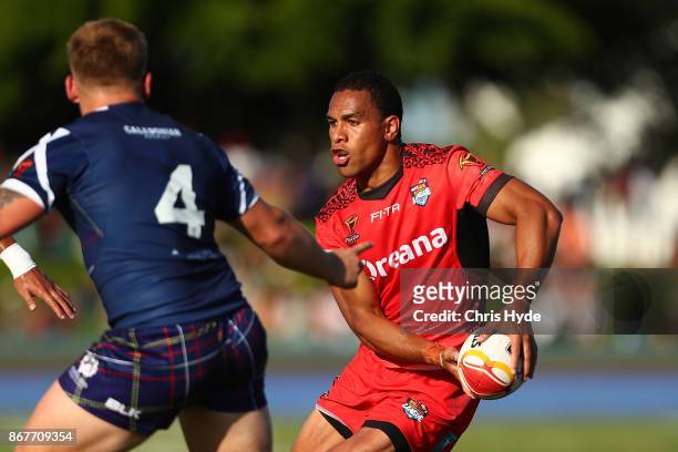 William Hopoate of Tonga passes during the 2017 Rugby League World Cup match between Scotland and Tonga at Barlow Park on October 29, 2017 in Cairns,...